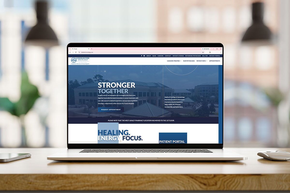Charleston Oncology website homepage open on a laptop showing the Stronger Together hero